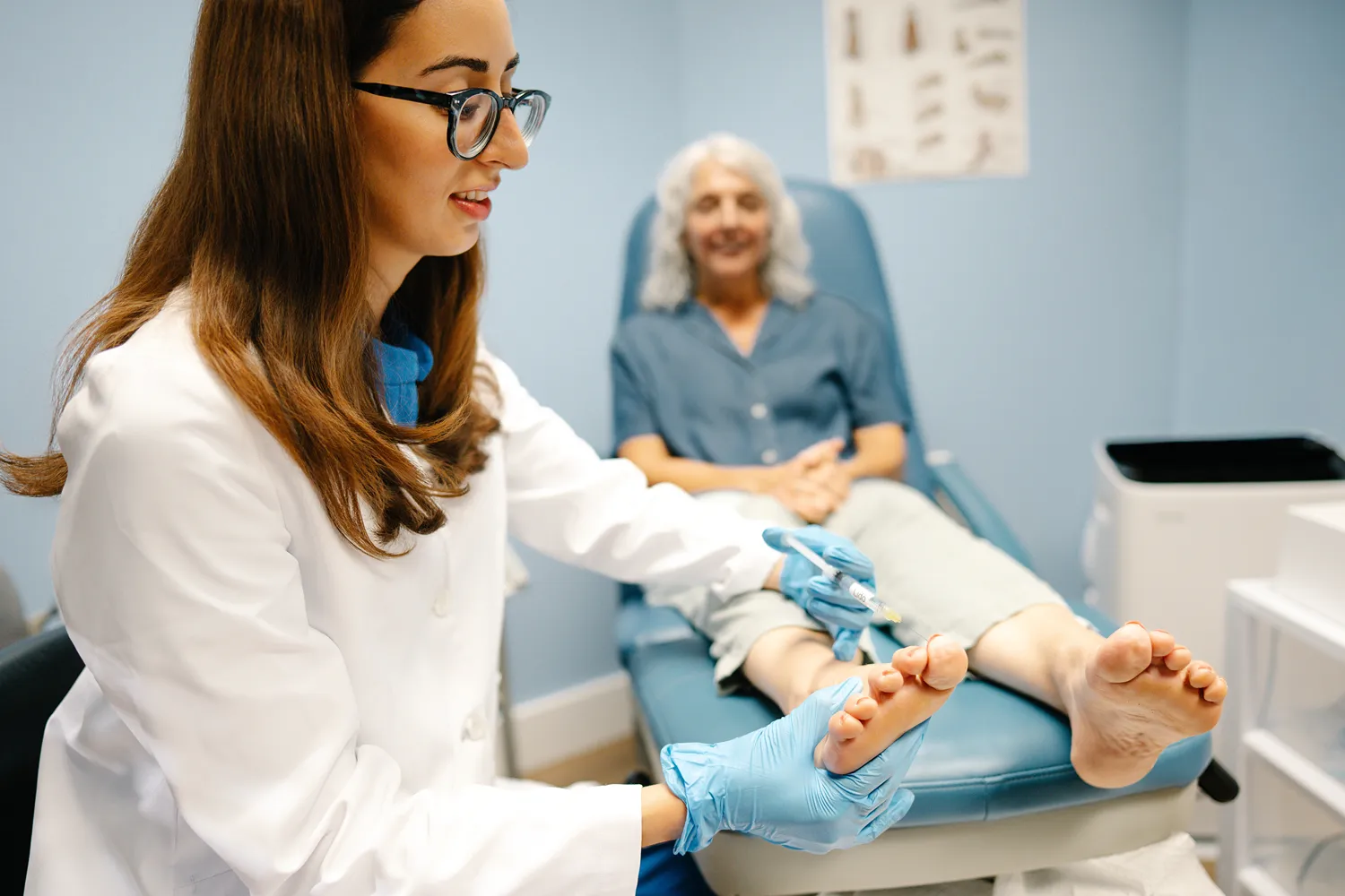 Healthcare professional creating digital marketing content for a medical practice.